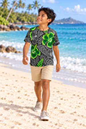 Digital Piko family boy model walking on a white sand beach wearing the Graphite Bright Green kids crewneck T-shirt