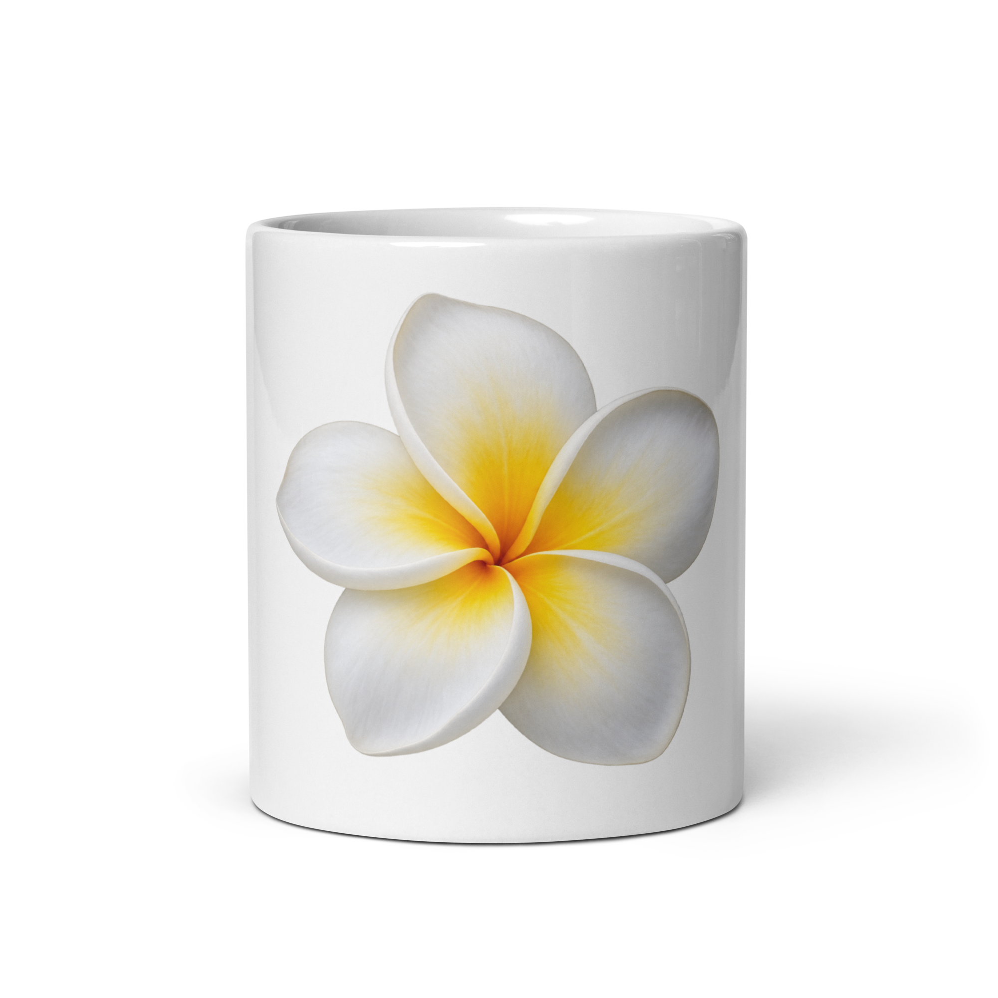 Full white plumeria on the front of a white ceramic mug. 11 oz shown; also available in 15 oz.
